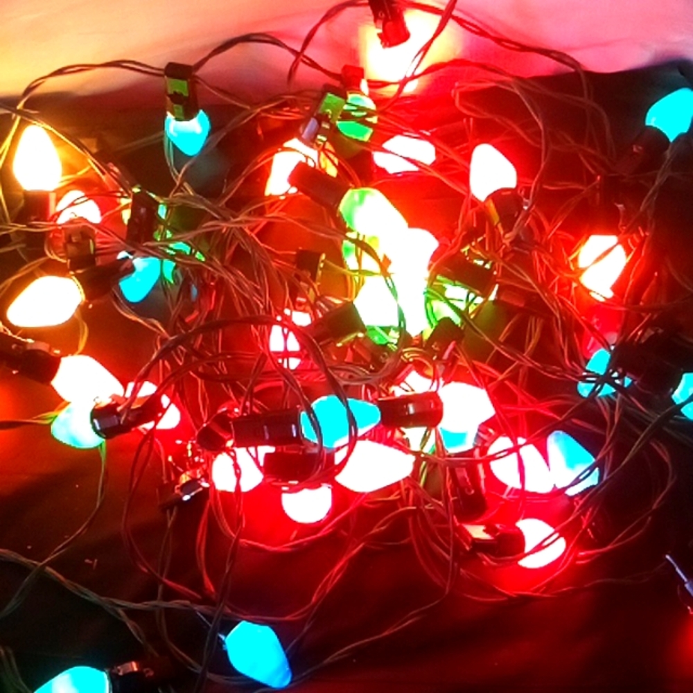 Incandescent screw in e- lights 50 feet: 2 strings & pack of spare bulbs